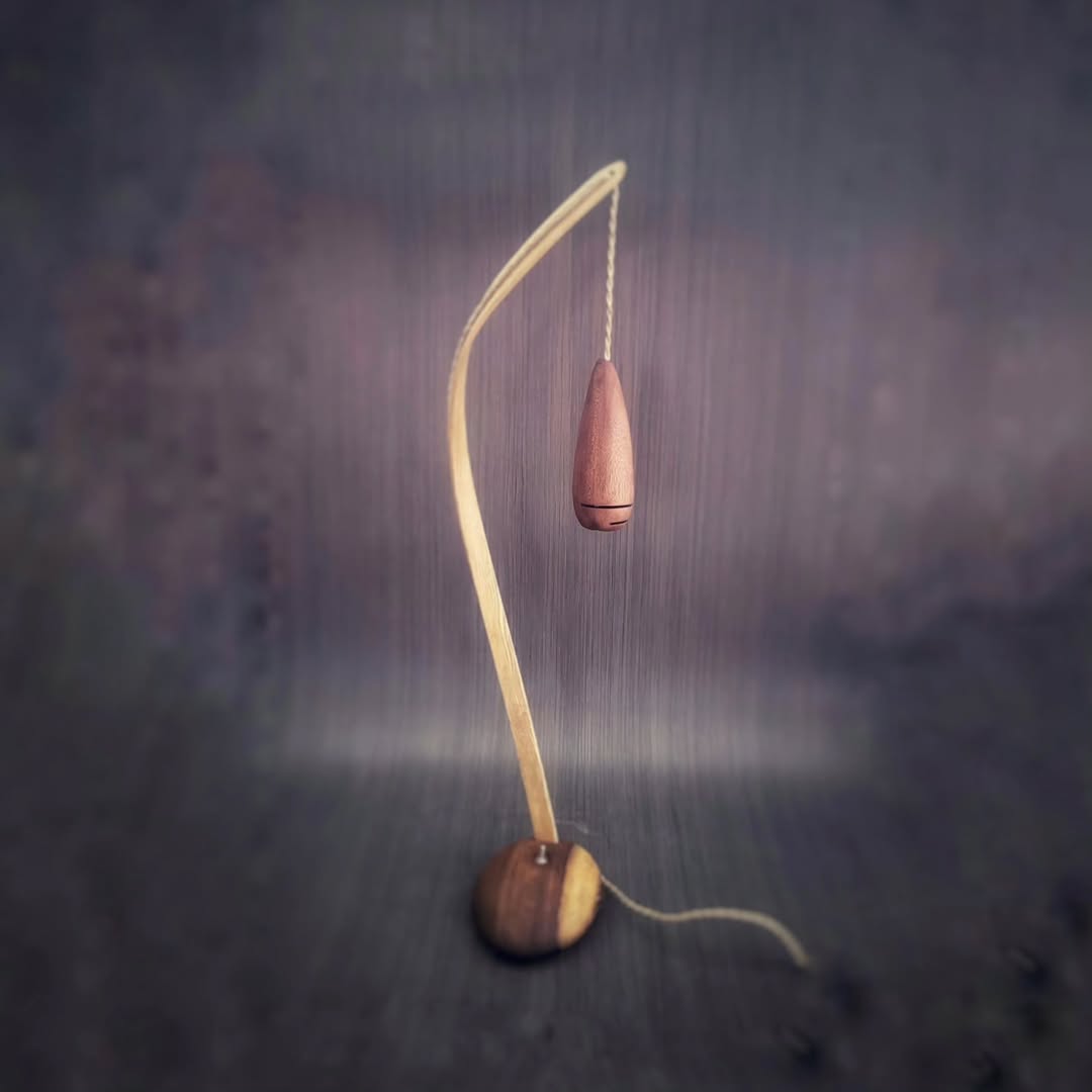 Steam-bent wood lamp by Arom Lumen — view on Instagram