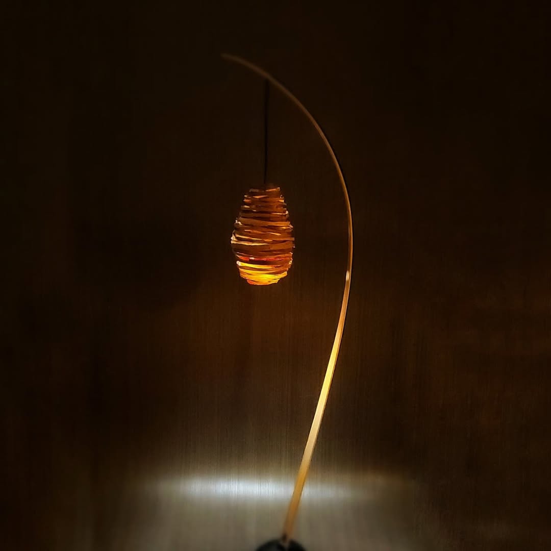 Flamme Noyer — flamed walnut veneer, fire-sculpted oak base